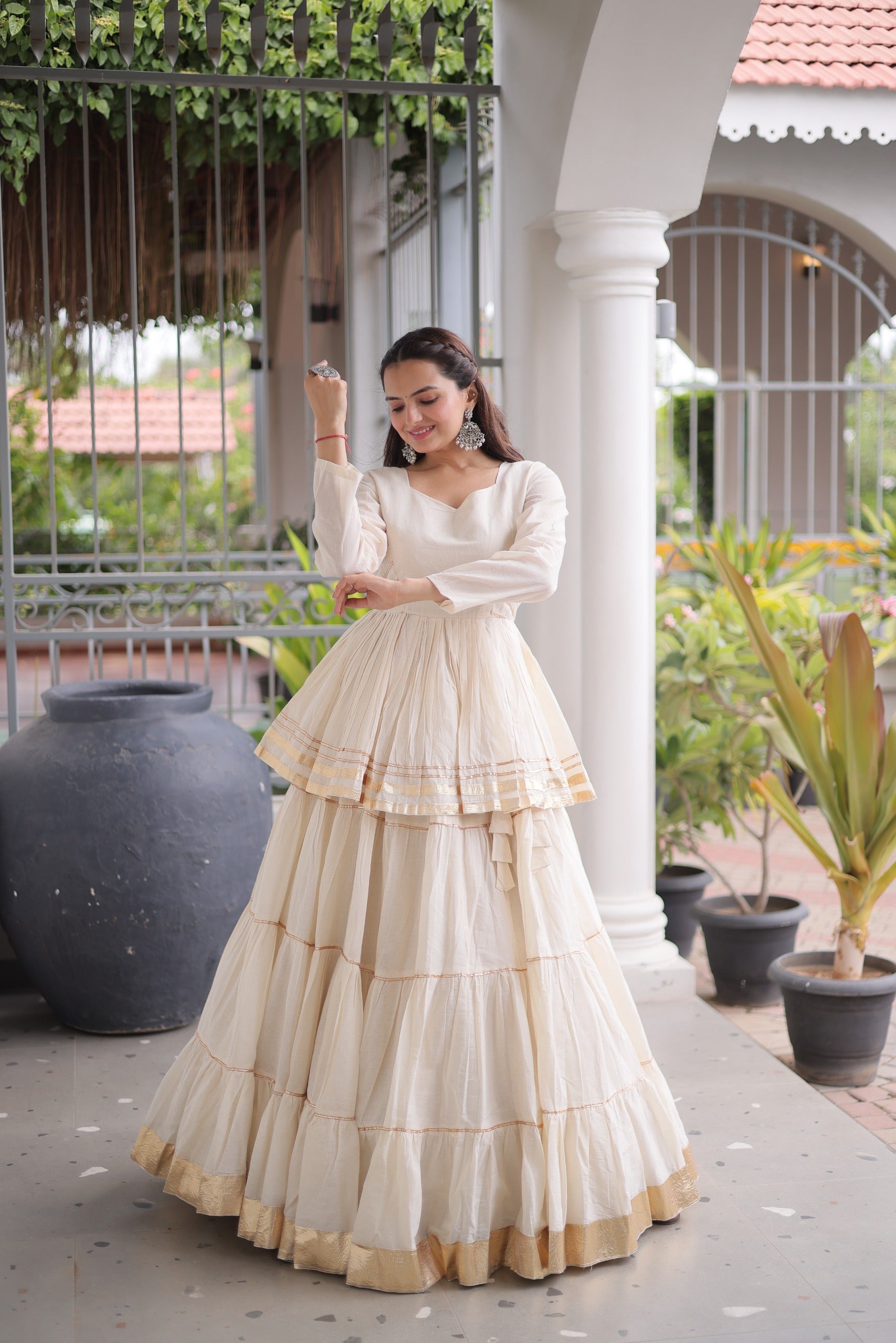 Premium White Tiered lehenga with Golden Zari Border